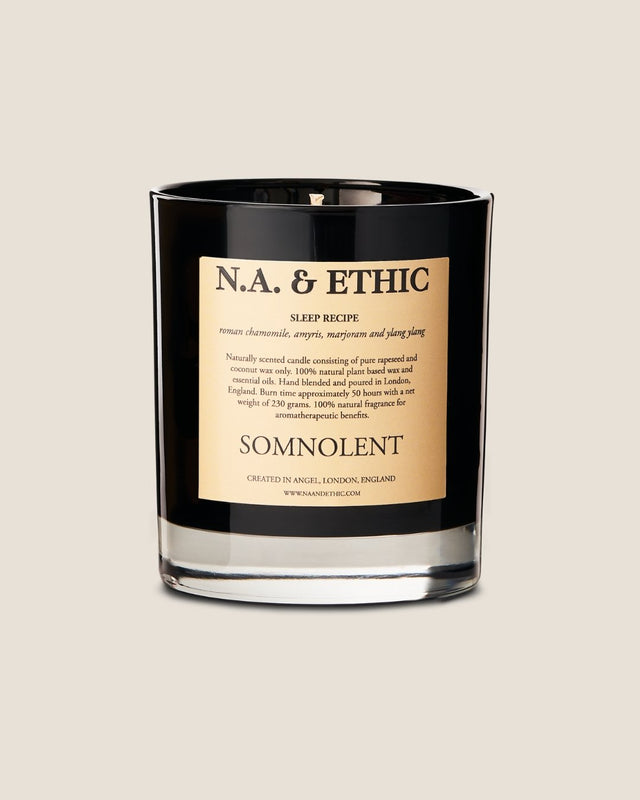 Luxury natural aromatherapy essential oil scented candle, handmade from biodegradable plant based rapeseed and coconut wax and pure essential oils. Sleep inducing candle for helping get to sleep and relax and reducing insomnia, and improving wellbeing. Hand-poured in the UK. Toxin free. Premium black glossy glass jar. 